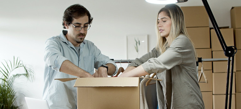 A couple packing a box