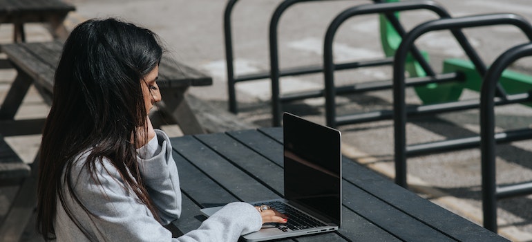 A woman using a laptop