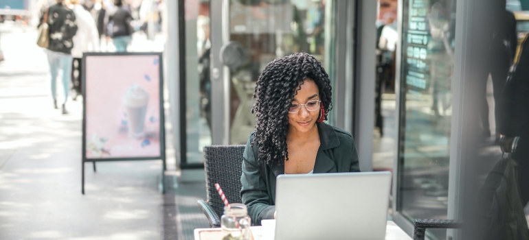 Woman reading a moving quote online