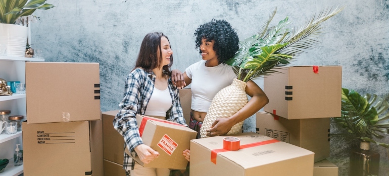 two women packing up 