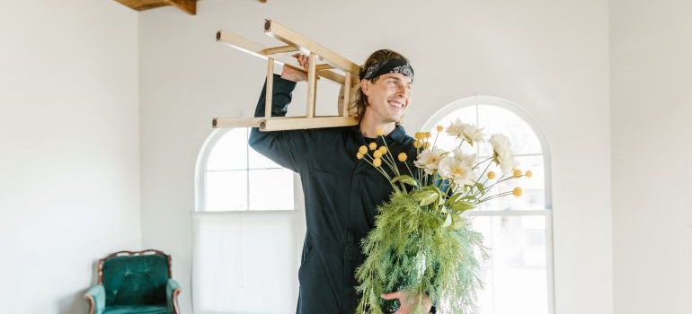 mover holding a plant