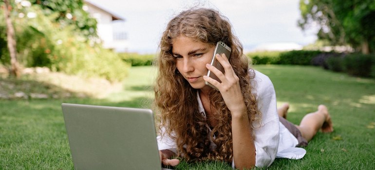 woman on the phone looking up long distance movers tamarac