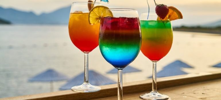 colorful cocktails at the beach in Cape Coral, one of the best foodie cities in Florida
