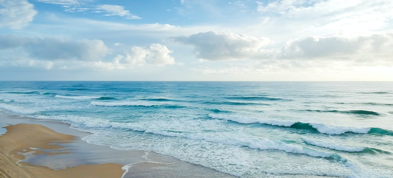 Beautiful coastline on a sunny day which is one of the reasons to move to Palm Bay