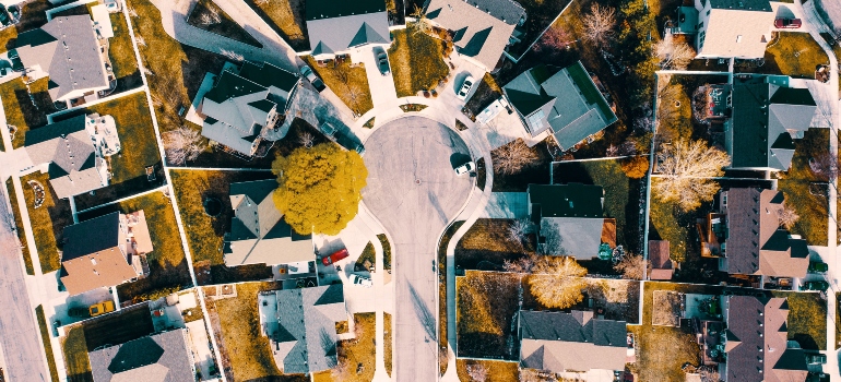 A bird's-eye view of a luxury neighborhood of houses