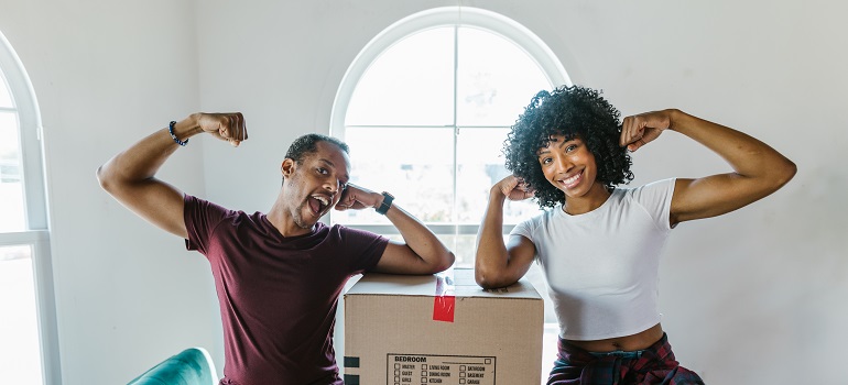 movers with a moving box