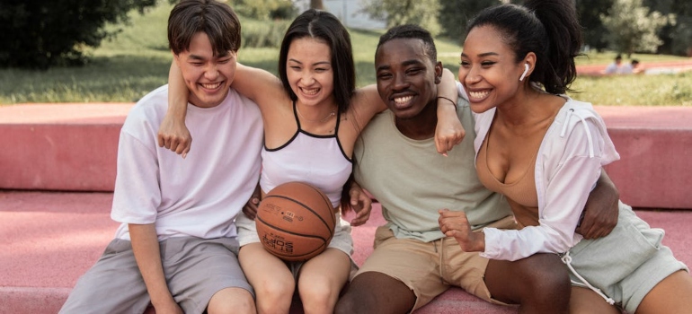 four people smilling