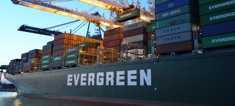 A green cargo ship for shipping in Florida