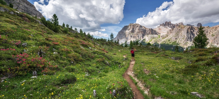 A hiking trail on a grass field