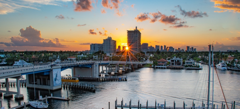 A body of water with boats under a bridge in Fort Lauderdale