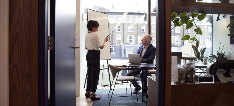 a woman giving a presentation