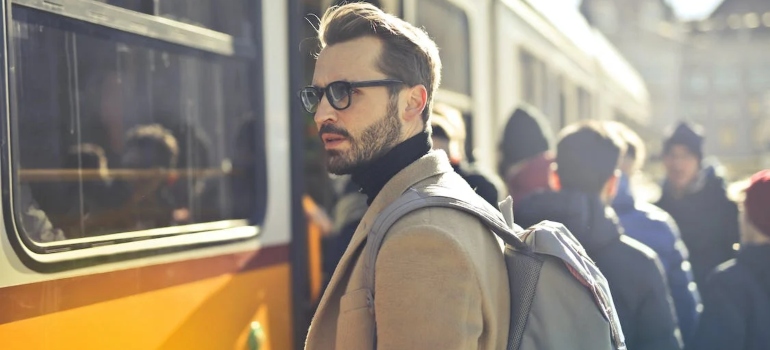 a man waiting for a train