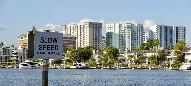 A body of water in Tampa Fl with a sign saying 