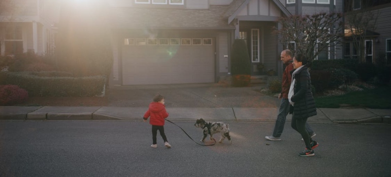 people walking a dog