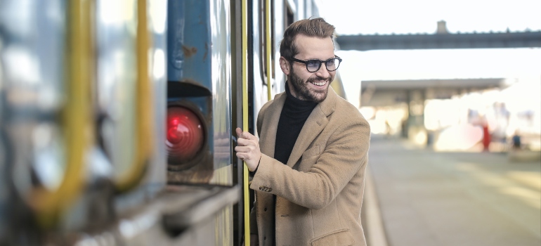 A man entering a train