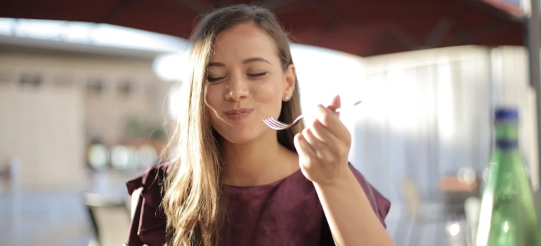 a woman enjoying a meal