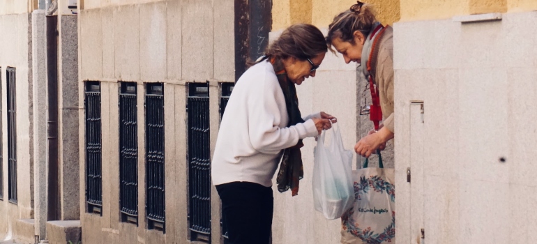 Picture of women holding bags 