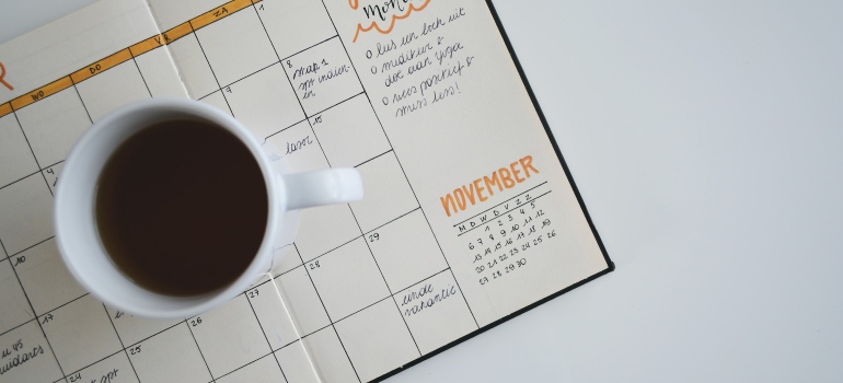 Picture of a cup of coffe on a planner