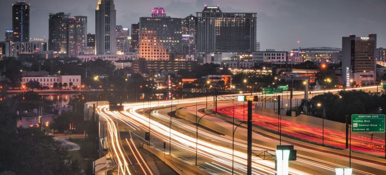 Buildings and night lights on the road in Orlando