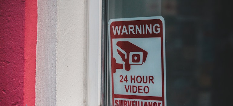 Surveillance warning notifying people that you protected your privacy during an open house in Florida