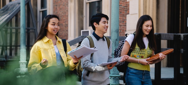 Three students walking