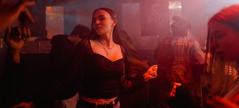 Woman dancing in the night club