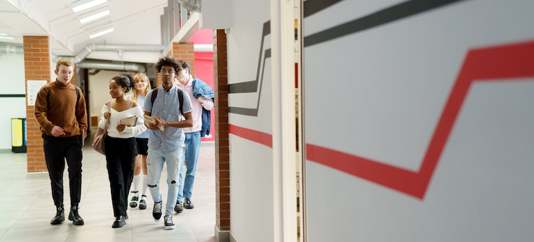 Students exploring their new school after moving from Miami to Gainesville