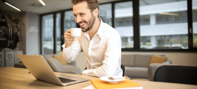 a man drinking coffee