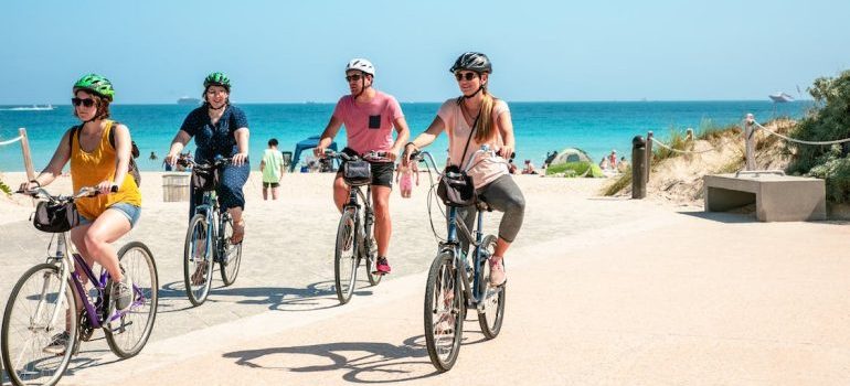 People riding bicycles at Miami Beach