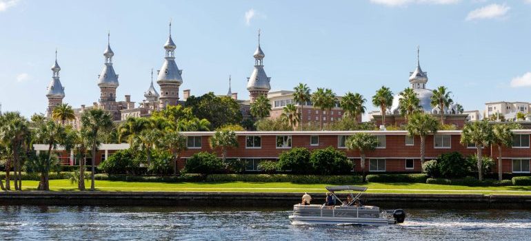 University of Tampa, boat on the water next to it