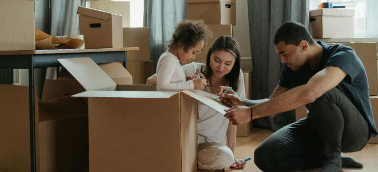 a family unpacking after buying a real estate in Gainesville