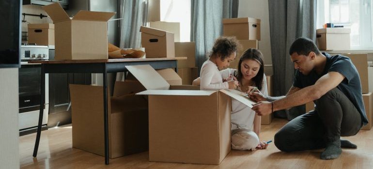 A family waiting for movers and packers CT offers